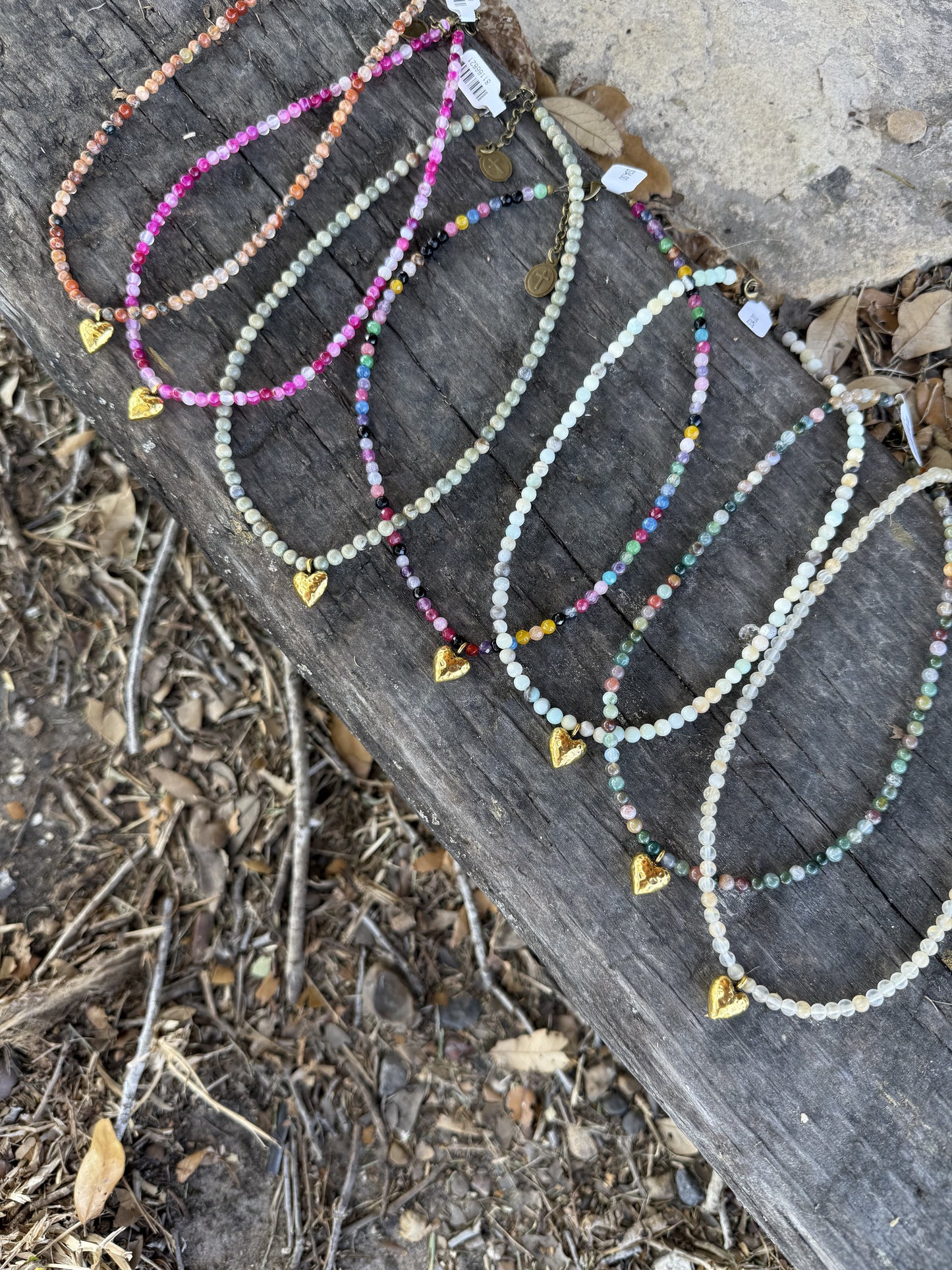 Gold heart pendant on quartz necklace